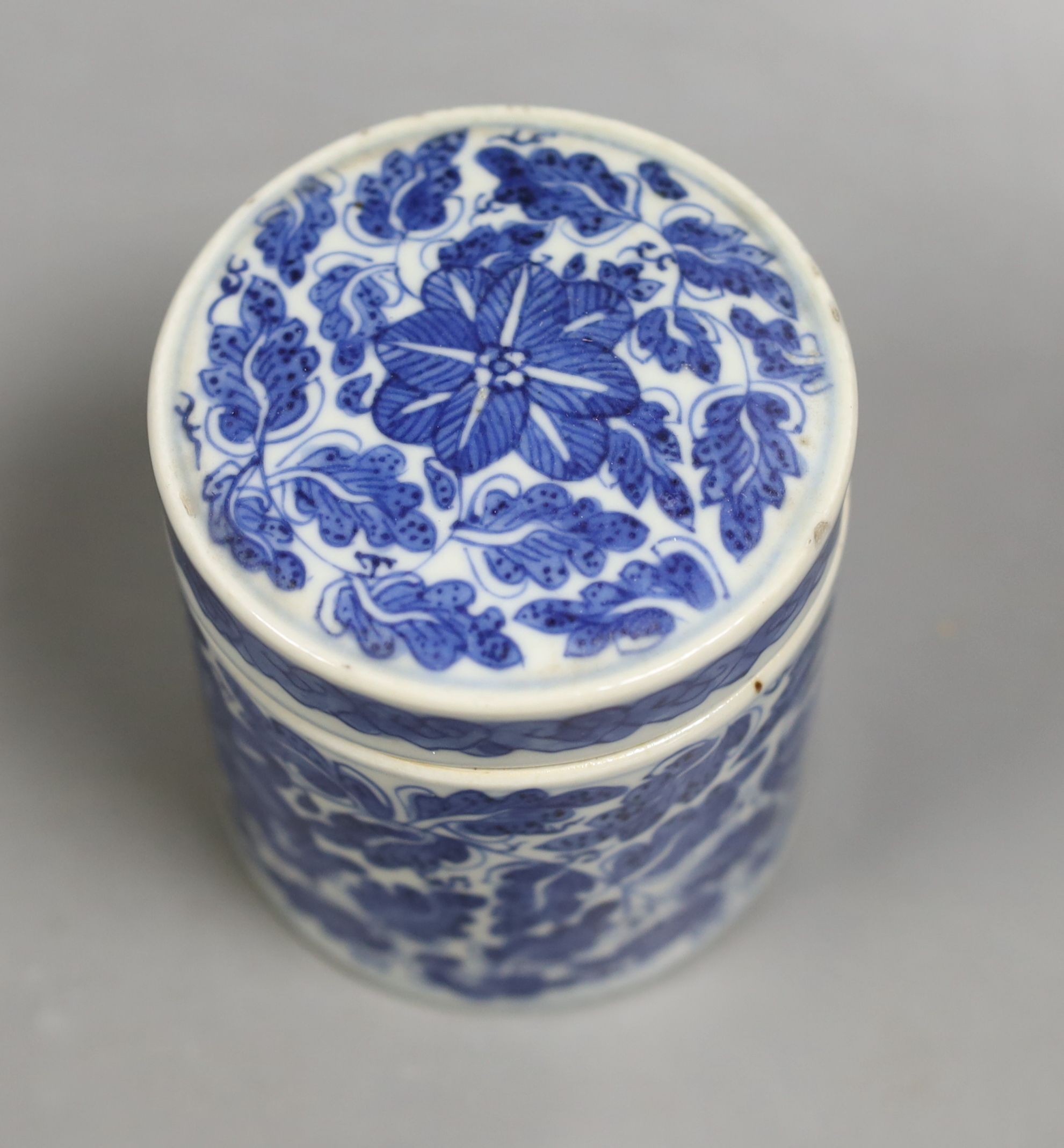 A 19th century Chinese blue and white pot and cover, 9 cms high.